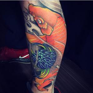 Asian traditional Koi leg sleeve.  Golden Iron Tattoo Studio is located on 363 Spadina Ave Toronto ON, M5T 2G3. For inquires on booking an appointment please contact (416)-903-1624 during opening hours 11:00AM-7:00PM