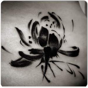 Water brush lotus flower tattooed by Yunyi Golden Iron Tattoo Studio is located on 363 Spadina Ave Toronto ON, M5T 2G3. For inquires or to book an appointment please contact (416)-903-1624 during opening hours 11:00AM-8:00PM