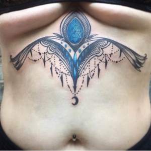 Custom Sternum tattoo design by Greg.  For all inquires check us out at http://goldenirontattoostudio.com/