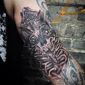 SKull & Bones Add On Tattoo By Grag For all inquires check us out at http://goldenirontattoostudio.com/