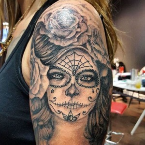 Half sleeve black grey day of the dead tattoo by Phillip For all inquires check us out at http://goldenirontattoostudio.com/