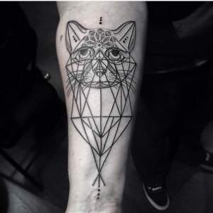 Custom cat geometric dot work design tattooed by Greg.  For all inquires check us out at http://goldenirontattoostudio.com/  