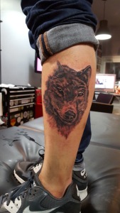 Wolf Head Tattoo Done By Phillip. For all inquires check us out at http://goldenirontattoostudio.com/