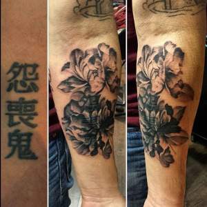 Script cover up tattoo with a Peony Flower by Kristian. For all inquires check us out at http://goldenirontattoostudio.com/