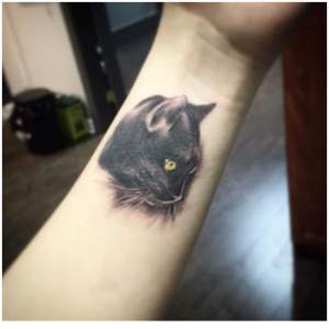 Black cat tattoo by Yunyi. For all inquires check us out at http://goldenirontattoostudio.com/