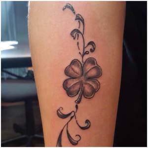 Filigree clover tattoo done by Phillip. For all inquires check us out at http://goldenirontattoostudio.com/