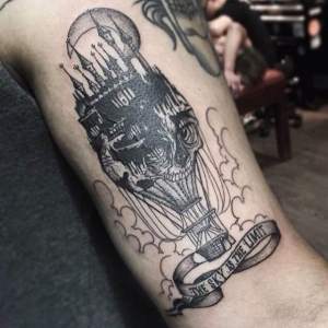 Hot air skull balloon custom designed tattoo by Gregory. For all inquires check us out at http://goldenirontattoostudio.com/
